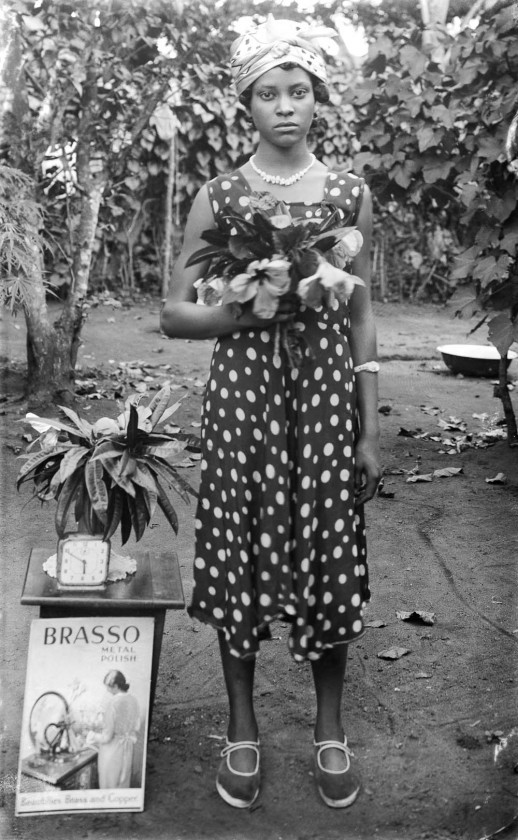 Woman standing with flowers