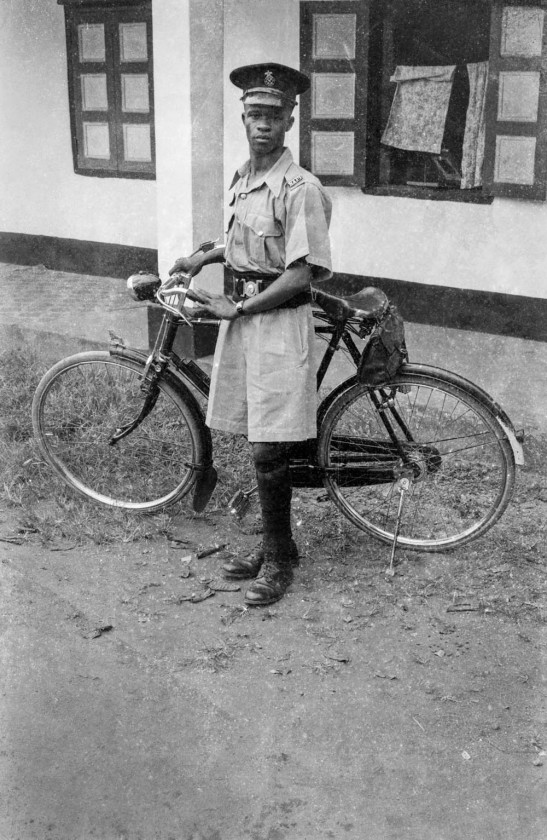Policeman with bicycle