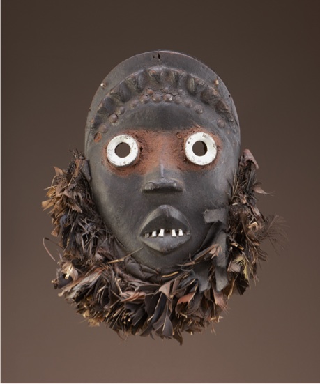 Bagle mask, called Slu (“Hawk”), c. 1965 Tompieme (active 1960–80) Dan artist, Liberia (Nyor Diaple town) Wood, metal, feathers National Museum of African Art, Bequest of William Siegmann in memory of Philip Ravenhill 2012-11-2