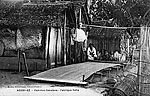 Sakalava women weaving an undyed raffia textile